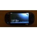 Sony Playstation Vita, Transparent Protective Hard Cover, 4GB Memory Card, 2 Games and Charger