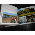 WILDERNESS SAFARIS - OUR JOURNEYS CHANGE PEOPLE`S LIVES -  PHOTO BOOK