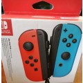 NINTENDO SWITCH JOYCON PAIR RED AND BLUE (GREAT CONDITION)