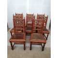 8 Oak Gothic style chairs