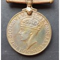 GB - WWII SERVICE MEDAL AND AFRICA STAR MEDAL PRESENTED TO 236015 I.M. OOSTHUIZEN