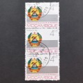 **R1 START** MOZAMBIQUE - 1984 EMBLEMS - 4m STATE ARMS - STRIP OF 3 - USED