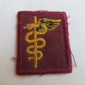OPS MEDIC/ 7 MEDICAL BATTALION CLOTH EMBROIDERED BREAST BADGE-GUARANTEED ORIGINAL-APPROVED 1984