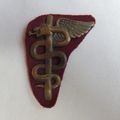 OPS MEDIC/ 7 MEDICAL BATTALION BRONZE ON PURPLE FELT BACKING BREAST BADGE-GUARANTEED ORIGINAL-APPROV