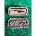 ARMY MARKSMAN PROFICIENCY BADGE- 1X EMBOSSED WITH 2 PINS-THE OTHER EMBROIDERED ON FELT BACKING