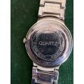 ROMANO QUARTZ LADIES WATCH-SOLD AS IS-NEEDS BATTERY