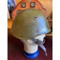 BULGARIAN M72 STEEL HELMET-USED IN ANGOLA DURING THE BORDER WAR-THERE IS A PLATE STUCK TO THE FRONT