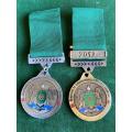 2X MEDALS FOR GRATITUDE TO JOHANNESBURG`S MILITARY VETERANS-BOTH ARE NUMBERED