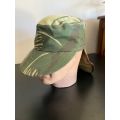 REPRODUCTION RHODESIAN CAMO FLAP CAP-SIZE XL INSIDE RING MEASURES 55CM-LABELLED AND DATED BY NIENMOL