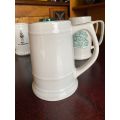 RHODESIA MUG WITH WILLGROVE WARE POTTERY,MAKERS STAMP-HEIGHT 14 CM-DIAMETER AT THE BOTTOM 11CM-GOOD