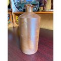 VERY LARGE WATT & LOVETT STONEWARE INK,BOTTLE WITH POURING LIP-GOOD CONDITION-DIAMETER AT BOTTOM 110