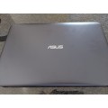 Almost New Asus I3 Laptop and bag