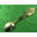Souvenir spoon as per pictures gold plated in good condition mark at back