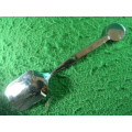 Sugar spoon of Anglican women and fellow in good condition.