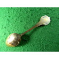 Sun City copper spoon in fair condition