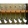 36 Souvenir (36 with charms 12 S.A ) spoons as per pictures  spoons in good condition with free rack