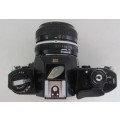Nikon EM SLR-Nikkor 50mm 1:2 Nikon Lens(needs cleaning)Shutter Fires Smoothly