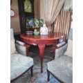 Inlaid wood round dining table