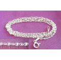 A SOLID SILVER 45CM CHAIN WITH INSERTS IN EVERY LOOP THAT GIVES THIS CHAIN A SPARKLING LOOK---NEW