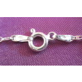 A SOLID SILVER 45CM CHAIN WITH INSERTS IN EVERY LOOP THAT GIVES THIS CHAIN A SPARKLING LOOK---NEW