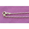 A SOLID SILVER BRACELET CHAIN AND 3 SOLID SILVER CHARMS---NEW