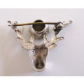 A VINTAGE STERLING SILVER  AND AMETHYST SCOTTISH STAG BROOCH BY WBS--WARD BROS.