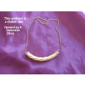 A STERLING SILVER BONE NECKLACE AND A CARVED BEADED BONE NECKLACE