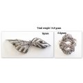 A STERLING SILVER MARCASITE BROOCH AND SILVER MARCASITE RING-COMBINED WEIGHT-14,8gram