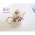 A DECORATVE TEAPOT--IN PERFECT CONDITION (A)