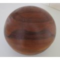 A FAIRLY LARGE WOODEN BOWL