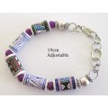 A CERAMIC AND SEMI-PRECIOUS STONE AFRICAN NECKLACE AND BRACELET WITH STAINLESS STEEL CLASP