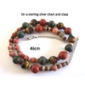 A LOVELY RUSTIC LOOKING MIXED SEMI-PRECIOUS STONE NECKLACE AND BRACELET--SET IN SILVER