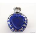 A czechoslovakia cobalt blue glass perfume bottle with silver tone overlay--Perfect