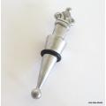 A CARROL BOYES WINE STOPPER WITH ORIGINAL RUBBER RING