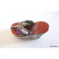 A SWAROVSKI METAL AND ENAMEL BEJEWELLED SHOE TRINKET BOX