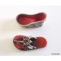 A SWAROVSKI METAL AND ENAMEL BEJEWELLED SHOE TRINKET BOX