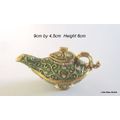 A SWAROVSKI METAL AND ENAMEL TEAPOT TRINKET BOX