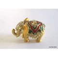 A SWAROVSKI  METAL AND ENAMEL TRINKET BOX IN THE FORM OF AN ELEPHANT