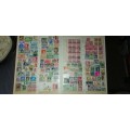 A4 STAMP ALBUM with hundreds of stamps - NOT ALL PAGES  SHOWN