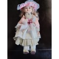 Gorgeous Quality Porcelain Doll with professionally made clothes on stand: See Description (1 of 4)