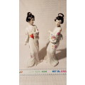 Elegant pair of Japanese Geisha figurines