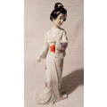 Elegant pair of Japanese Geisha figurines