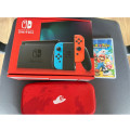 Nintendo switch with games and pouch