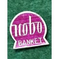 Pin: Vintage Dutch Advertising  - `Nobo Banket` - Purple