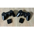 2 x Playstation 2 Wireless Controllers