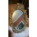 A Stunning Ornate Oval Gilt Framed Mirror