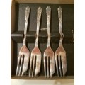 An Assortment of Silver Plated CoffeeSpoons and 4 Cake Forks: Emess Plate, Elwezetta Plateand epns