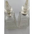 A Pair of Henry Perkins and Sons Silver Collared Scent Bottles
