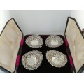 A Boxed Set of 4 Silver Repousse Heart Shaped Bon Bon Dishes 1895 Mitchell Bosley andCo