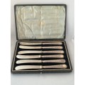A Boxed Set of 6 Walker and Hall Silver Butter Knives
